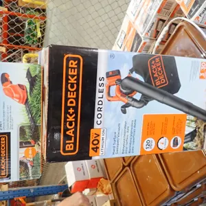 Lot of Black & Decker Surface Sweeper/Vacuum and Black & Decker 2-in-1 Garden Shears.