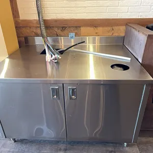 Orkin Stainless steel drink station with backsplash, 52” wide, 40” deep, 33” height plus 4” backsplash