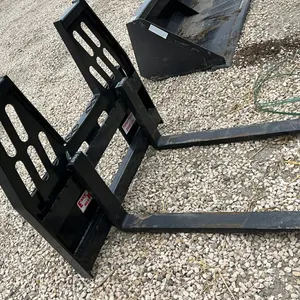 OFFSITE - Pallet forks, forks are 48 inches long, 2000 pound capacity. Skid steer mounting. Model # PF02M