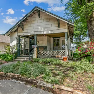Absolute Auction - 308 E 6th St – Where Location Meets Opportunity 