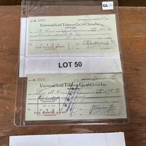 2-antique Universal Leaf Tobacco Co. bank checks