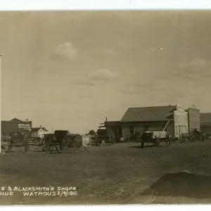 1910 RPPC – “Livery Barns & Blacksmith’s Shops.  Third Avenue.  Watrous 2