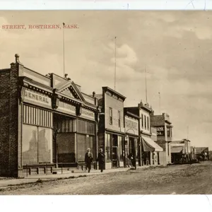 1918 RPPC – “Railway Street, Rosthern, Sask”.  Posted
