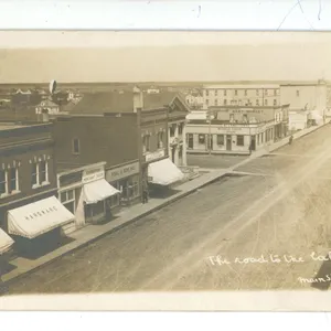 1912 RPPC – “The Road to the Lake.  Main St. Watrous” Sask.