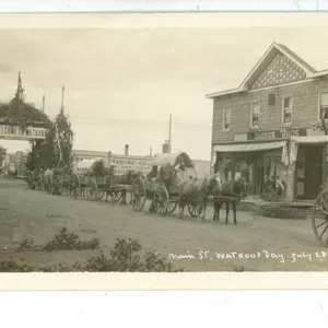RPPC – “Main St. Watrous Day.  July 28th, 1911”.  Watrous, Sask.