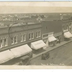 1912 RPPC – “Main St. Watrous, Sask”.  Posted.
