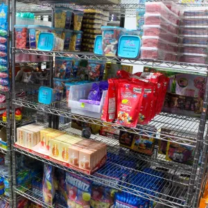 LARGE LOT OF ASSORTED CANDIES INCLUDES R2 DELIX
