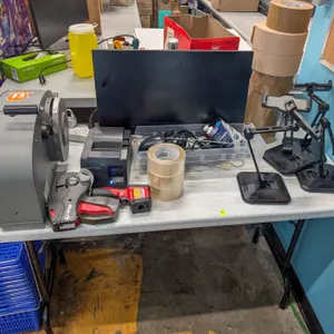 FOLDING TABLE (APPROX 4') WITH CONTENTS INCLUDES