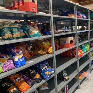 CONTENTS OF ENTIRE SHELVING UNIT - CHIPS, BEEF JERKY, NUTS, CRACKERS, POPCORN, SALSA & ASSORTED