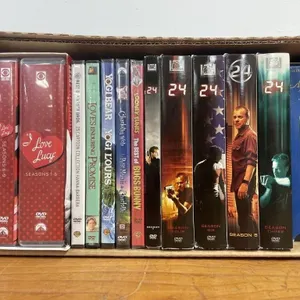 Box of popular movies and TV shows on DVD.