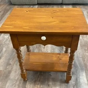 Wooden table with drawer