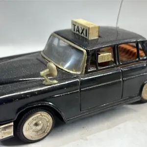 Vintage tin Friction Mercedes Taxi Toy car