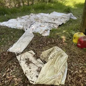 Tarps Located in the Yard