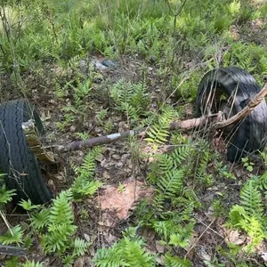 Trailer Axle with Pontiac Emblem On Hubcap
