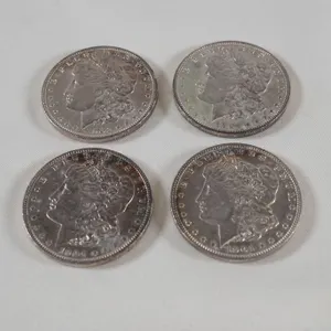 Lot of (4) 1904 Morgan Silver Dollars