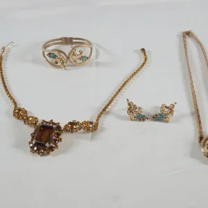 Lot of Assorted Yellow Metal Jewelry w/Colored Stones