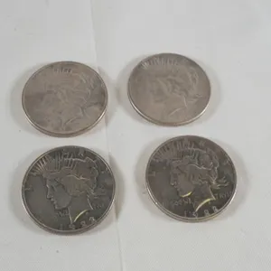Lot of (4) 1922 Peace Dollars