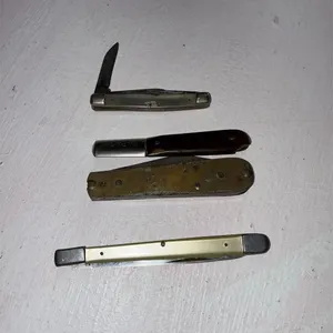 set of four pocket knives *all busted handles*