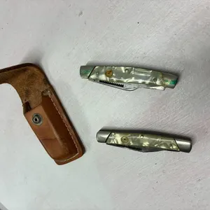 Two pocket knives with case