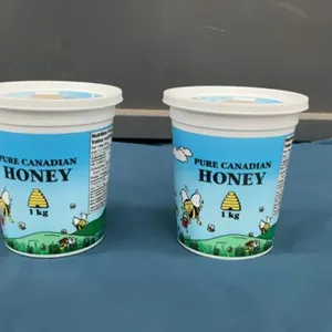 (2) CONTAINERS OF PHILPOTT HONEY - 1 KG EACH