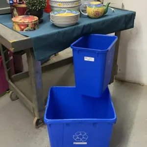 RIVAL CROCKPOT, (2) RECYCLE BINS, MISC STORAGE TINS, POPCORN CERAMIC BOWL, RED COFFEE POT