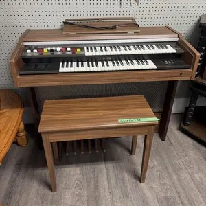 Yamaha Electric Organ with Stool and Music Books