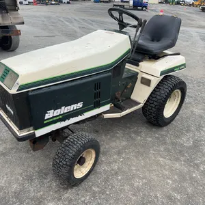 Bolens Diesel Lawn Tractor with 50” Mower Deck, 48” Blower and Box of Attachments