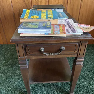 Small table and books, 25 x 15 x 21”