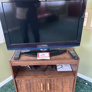 32 inch Toshiba television and stand, 28 x 16 x 25.5”