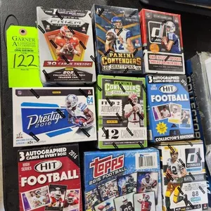 9 Boxes of Football Cards