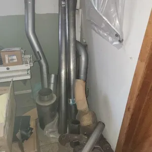 Lot of Exhaust Pipes  (Right Corner of Room)