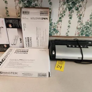 Deni Vacuum Sealer- included pouches & rolls