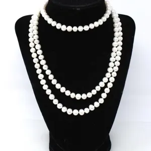 48" LONG CONTINOUS STRAND OF PEARLS $400