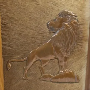 African Copper Tooling Lion on Antelope Skin