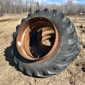 SET OF 18.4-38 TIRES ON CLAMP ON DUAL RIMS