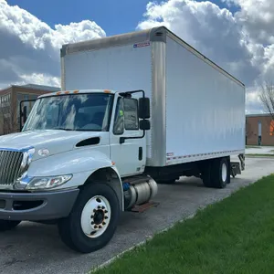 2017 International 4300 SBA 4x2 box truck. Features a 26' Morgan box with a roll-up rear door and a tuck-under liftgate. Powered by a Cummins engine w