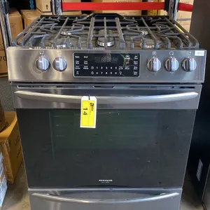 FRIGIDAIRE MODEL FGGH3047VD. 5.4 CU.FT. STAINLESS & BLACK 5 BURNER RANGE STOVE