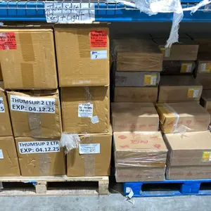 SHELF SPACE OF WHOLESALE PRODUCT INC. THUMBS UP PET BOTTLES, ORANGE FANTA AND MORE.