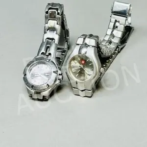 2 ladies quartz watches - Swiss army & Roots