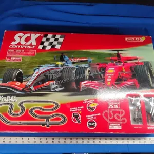 SCX Compact F1 slot car set