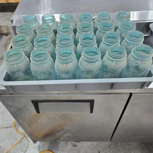 24 blue colored Ball mason jars