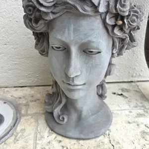 Solid Rock Stone Works Rose Woman Planter in a