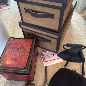 Decorative leather covered boxes, tobacco tin, curling iron, sad iron, purse, and horseshoe