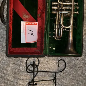 Cornet (late 19th or early 20th cenury) and music stand