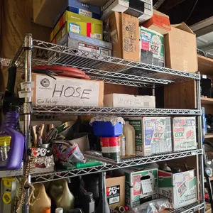 CONTENTS OF METRO STYLE SHELVING IN GARAGE