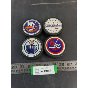 (4) NHL Team Logo Pucks