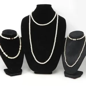 THREE FAUX PEARL NECKLACES