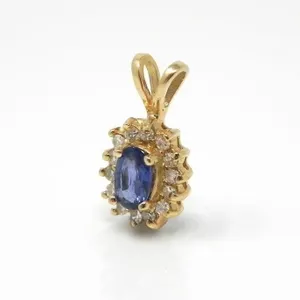 14KT GOLD PENDANT W/ BLUE STONE & DIAMONDS 0.9g