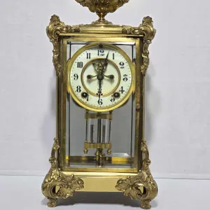 Ansonia Marquis Crystal Regulator Clock. Winds, Ticks and has a Clear Chime. No key. 7.5 x 6 x 15. The Top Piece is not attached the screws fell out, 