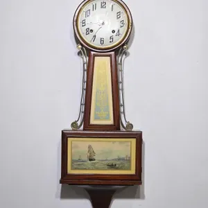 New Haven Whitney #2 Banjo Wall Clock. Winds, Ticks and has Clear Chime. 9.5 x 4 x 28.5. A3